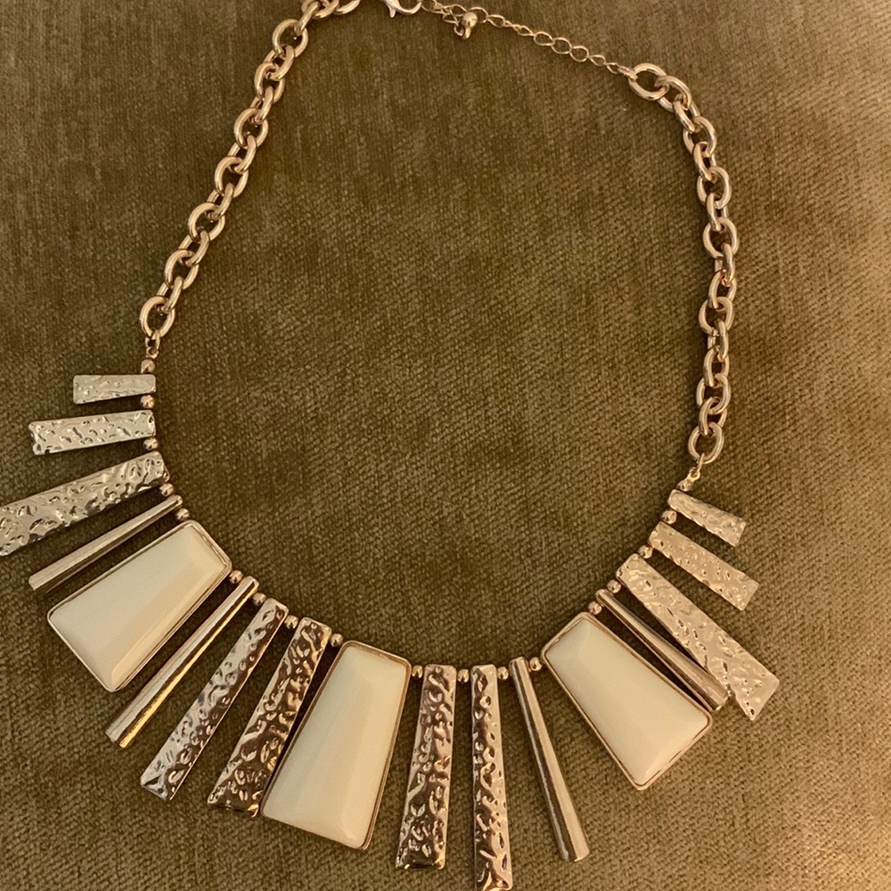 Women’s gold and white statement necklace